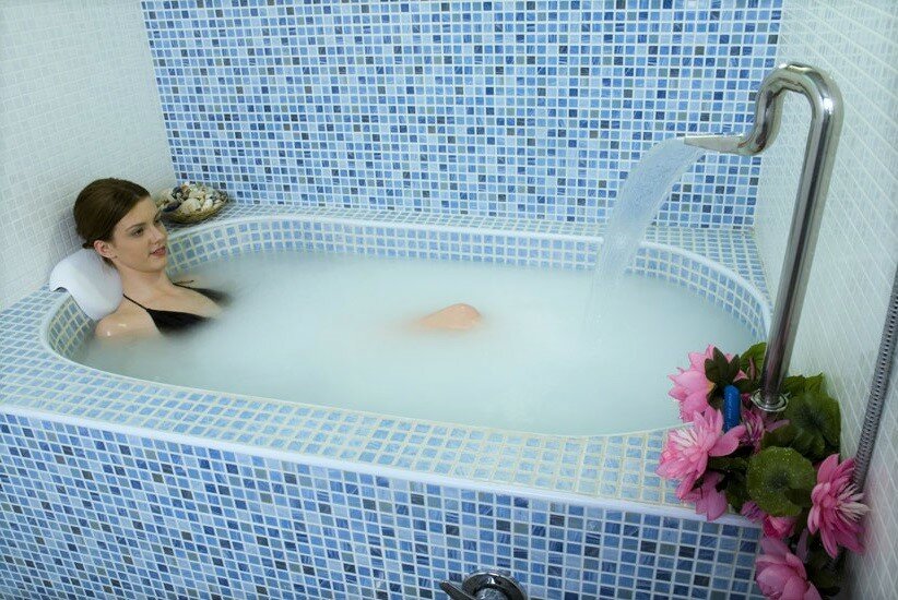 a girl enjoys a mineral bath in the Katlanovo spa girl enjoys a mineral bath in the Katlanovo spa